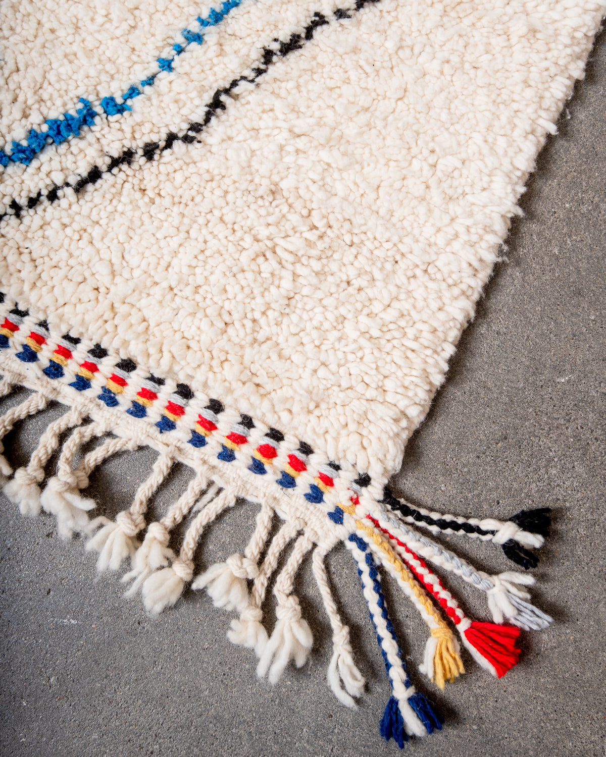 Modern, designer, handcrafted Berber rug from Morocco. Beniourain carpet with beautiful colours and patterns and fluffy wool texture.